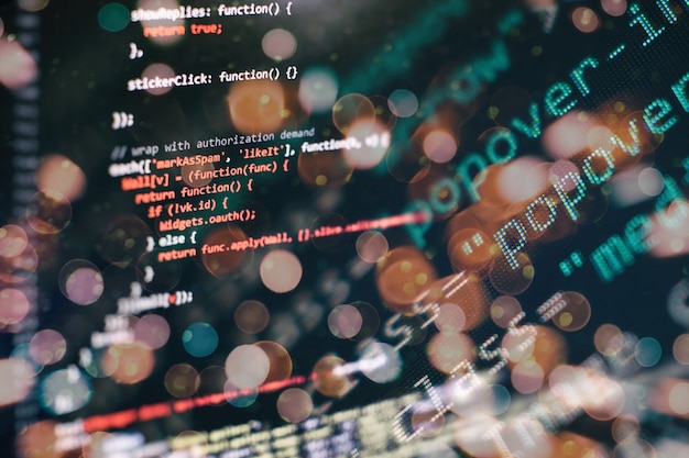 Photo monitor closeup of function source code.writing programming functions on laptop. big data and internet of things trend.