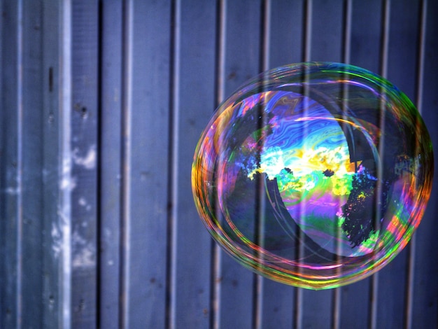 Photo multi colored bubble in mid-air