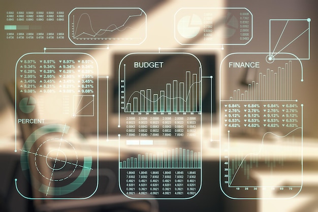 Photo multi exposure of abstract statistics data hologram interface and modern desk with computer on background computing and analytics concept