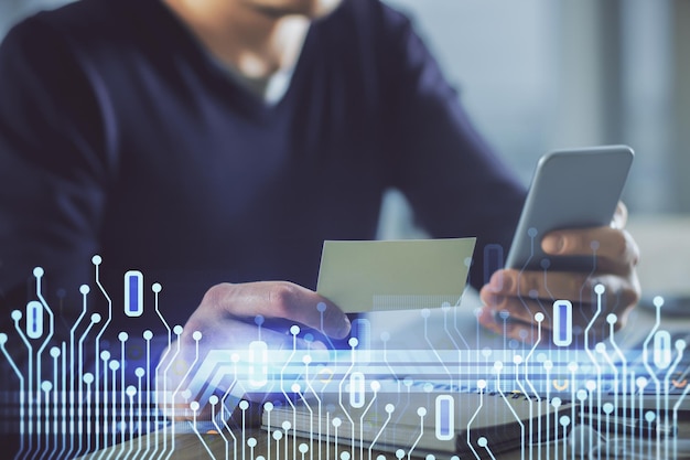 Photo multi exposure of man's hands holding and using a digital device and data theme drawing innovation concept