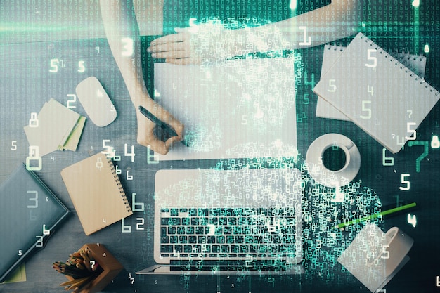 Photo multi exposure of writing hands on background with data solution hologram technology concept