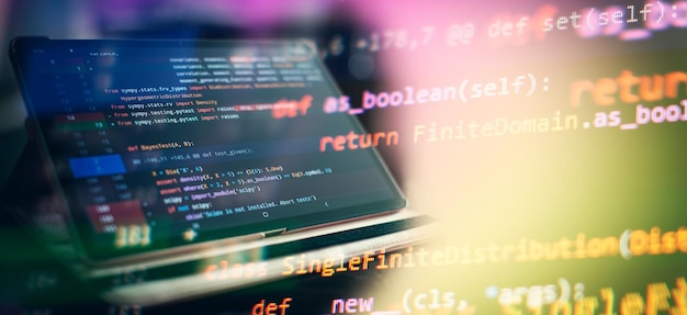 Photo notebook closeup photo css javascript and html usage monitor closeup of function source code abstract it technology background