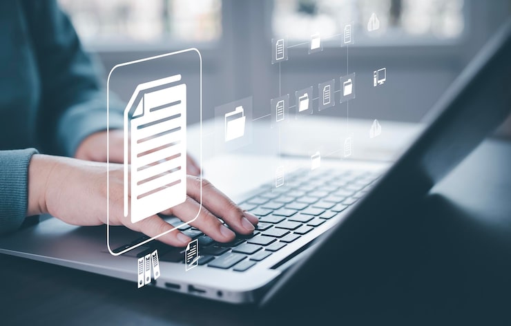 Online documentation database and document management system concept Businessman using a tablet or computer Document Management System and Automation software to archiving and efficiently manage
