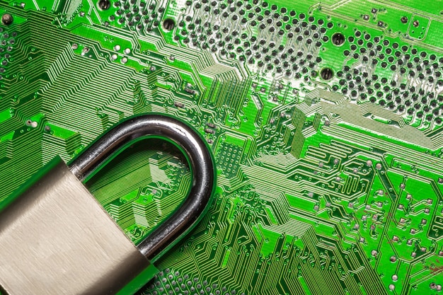 Photo padlock on a computer circuit board