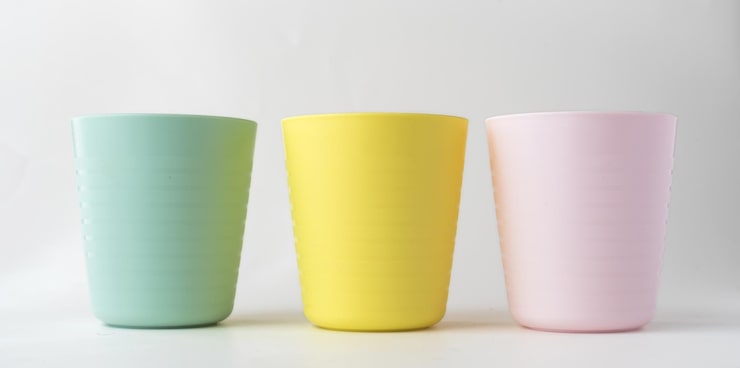 Plastic cups isolated on white background Kids colorful plastic cups