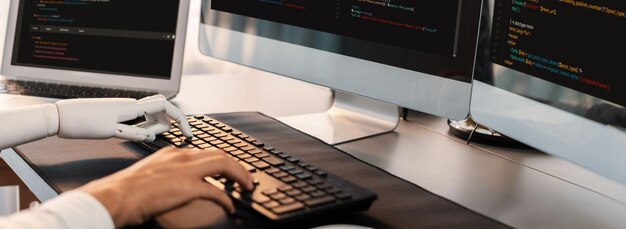 Photo program coding automation by generative artificial intelligence or ai concept collaboration between robotic hand and human software developer solving debugging or writing scripttrailblazing