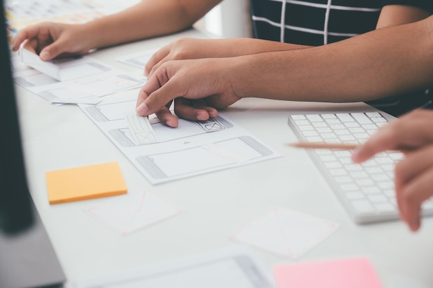 Photo programmer and ux ui designer working in a software development and coding technologies. mobile and website design and programing development technology.