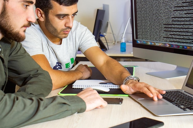 Photo programmers working with code programmer codding