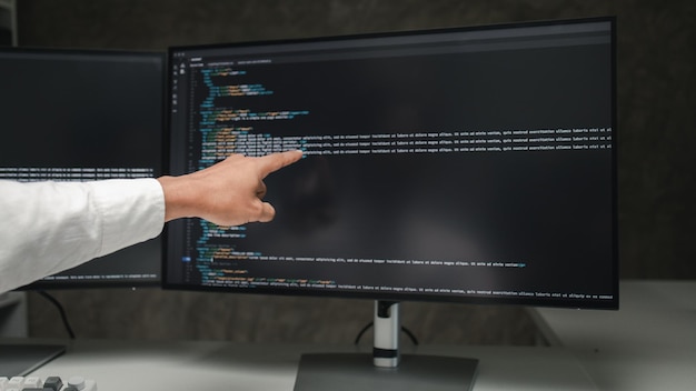 Photo programmers write programs on the computer designing programs to meet the needs of users and friendly users designing programs to help manage various operations easily programmer concept