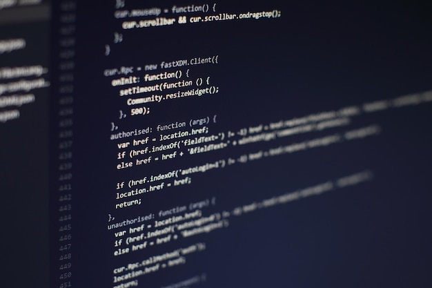Photo programming code on computer screen. software development. writing program code on computer.