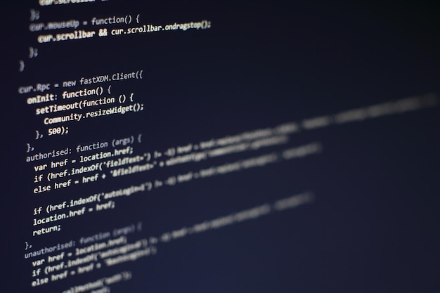 Photo programming code on computer screen. software development. writing program code on computer.