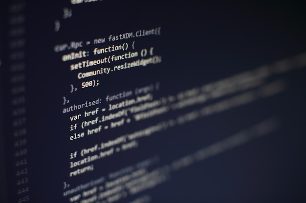 Photo programming code on computer screen. software development. writing program code on computer.