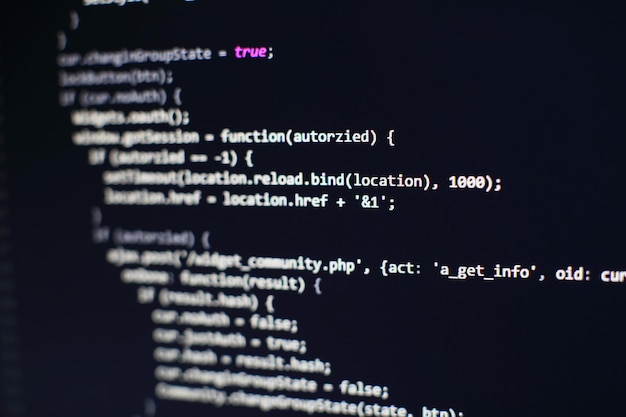 Photo programming code on computer screen. software development. writing program code on computer.