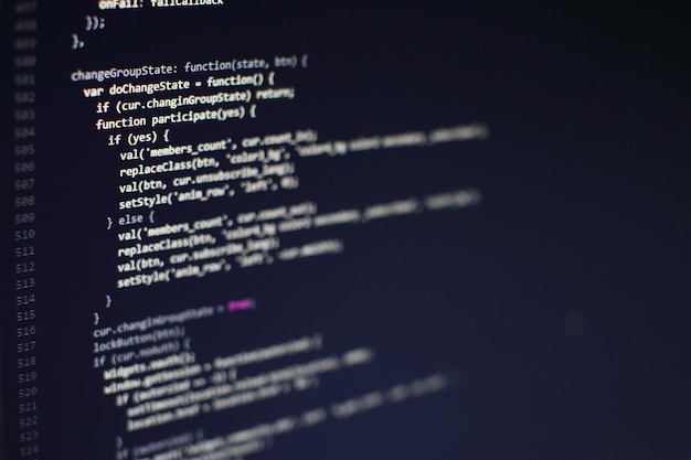 Photo programming code on computer screen. software development. writing program code on computer.