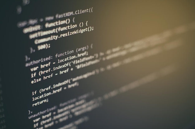 Photo programming code on computer screen. software development. writing program code on computer.