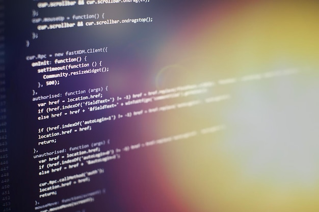 Photo programming code on computer screen. software development. writing program code on computer.
