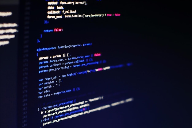 Photo programming code on computer screen. software development. writing program code on computer.