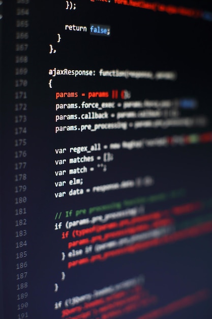 Photo programming code on computer screen. software development. writing program code on computer.