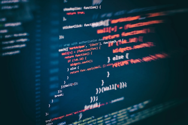 Photo running computer data / www programming. coding script text on screen. notebook closeup photo.