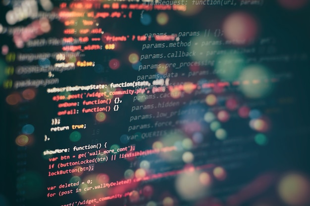 Photo running computer data / www programming. coding script text on screen. notebook closeup photo.