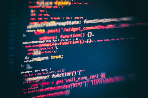 Photo running computer data / www programming. coding script text on screen. notebook closeup photo.