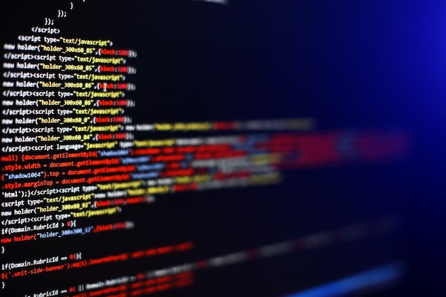 Photo software developer programming code. abstract computer script code. selective focus
