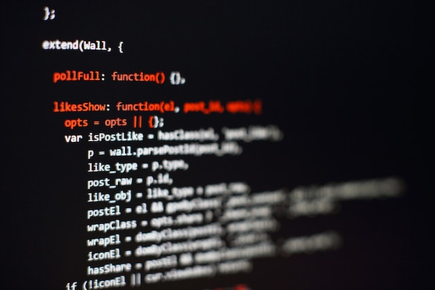 Photo software developer programming code. abstract computer script code. selective focus