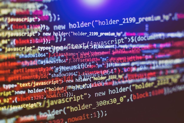 Photo software developer programming code. abstract computer script code. selective focus