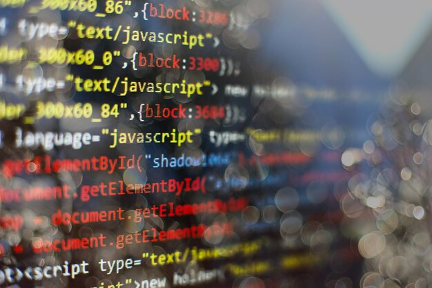 Photo software developer programming code. abstract computer script code. selective focus