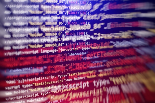 Photo software developer programming code. abstract computer script code. selective focus