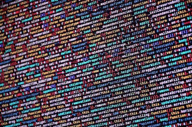 Photo software developer programming code on computer. abstract computer script source code