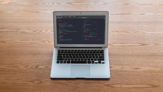 Photo software development programming on computer screen for modish application and program coding