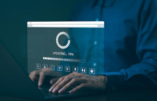 Photo update software application and hardware upgrade technology concept user is using laptop software update or operating system upgrade updating progress bar on computer screen install app patch