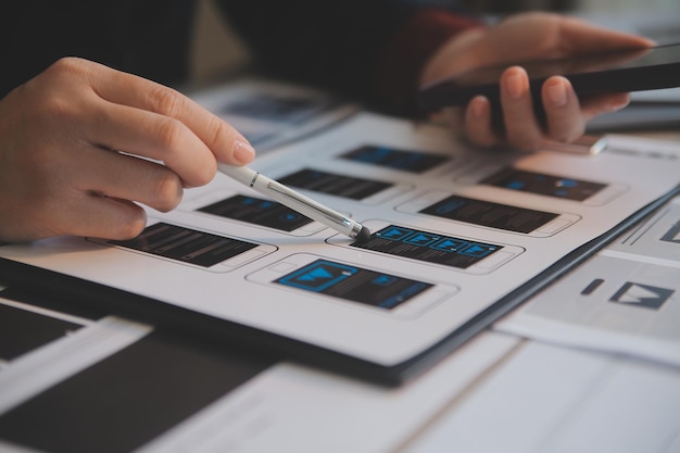 Photo ux ui design process for modish mobile application and website creative prototype of wireframe for professional app developer