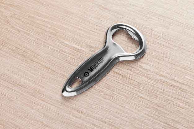 PSD bottle opener on table mockup