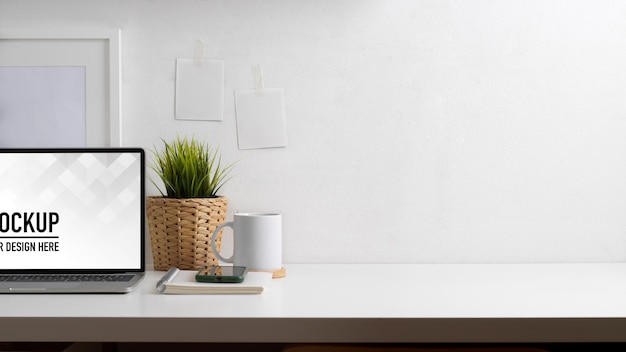 PSD close up view of workspace with laptop mockup