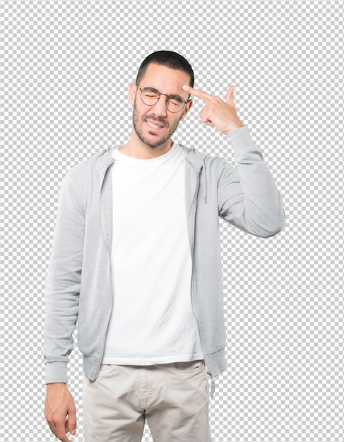 PSD depressed young man making a suicide gesture