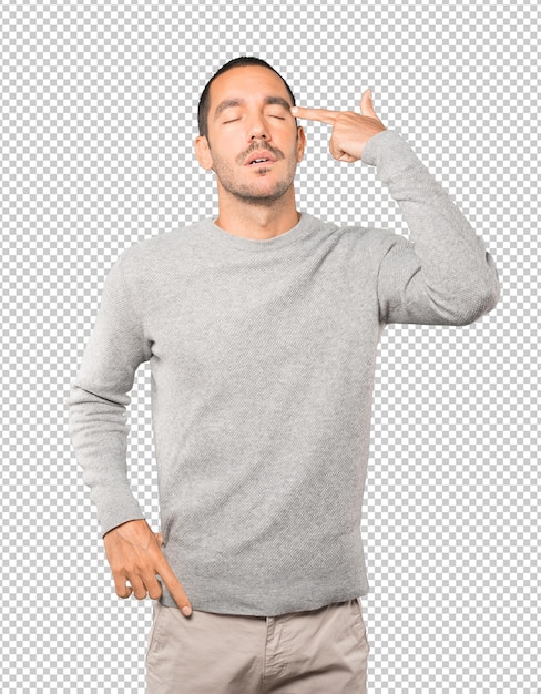 PSD depressed young man making a suicide gesture