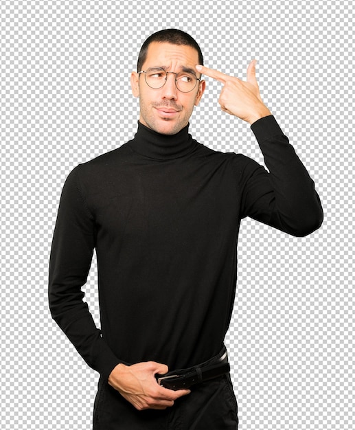 PSD depressed young man making a suicide gesture