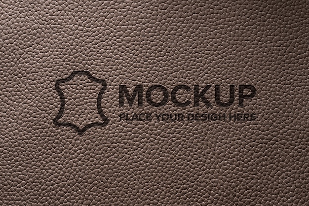 PSD dramatic warm light over leather logo mockup