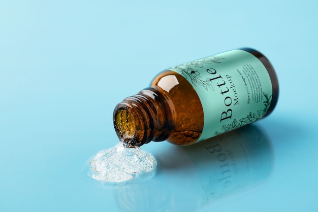 PSD glass bottle mockup with liquid inside