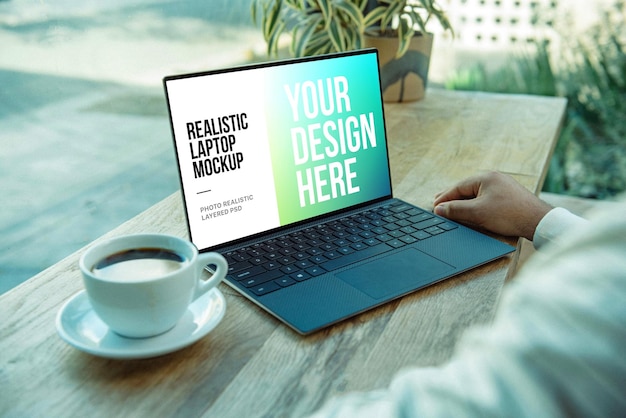PSD a laptop with a cup of coffee