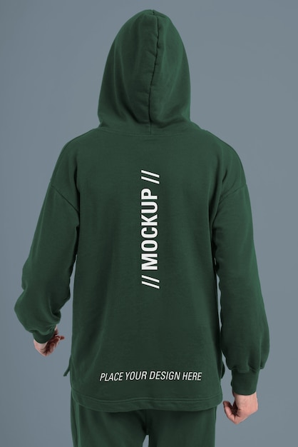 PSD man wearing jogger pants and hoodie mockup