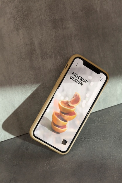 PSD phone on concrete wall with shadow