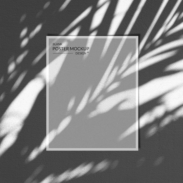 PSD poster mockup with palm leaf shadows on a gray wall