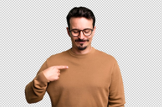 PSD smiling cheerfully and casually looking downwards and pointing to chest