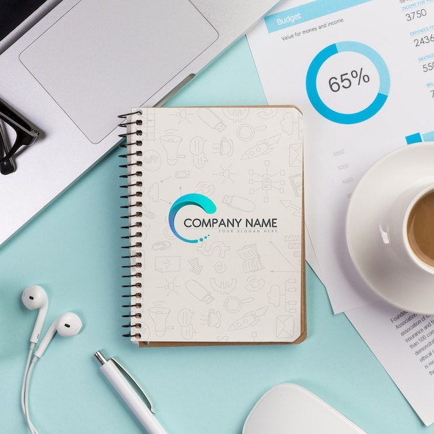 PSD top view desktop concept with cup of coffee