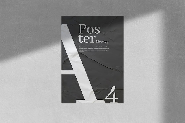 PSD wrinkled poster mockup on wall texture