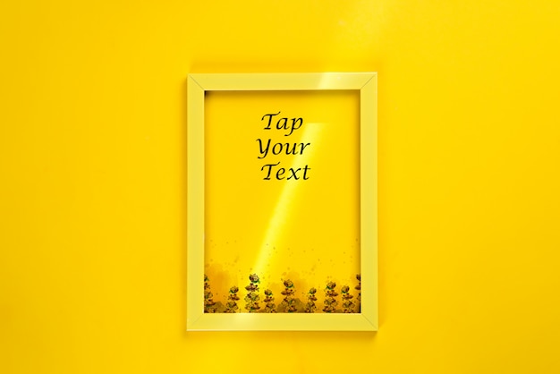 PSD yellow frame with a ray of sunshine isolated on yellow surface