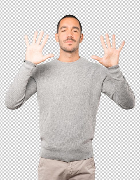PSD young man making a number ten gesture